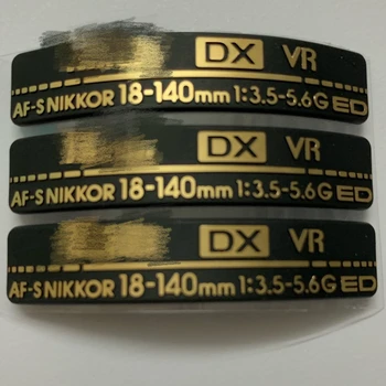 1GB Pavisam jaunu Nikon AF-S Nikkor 18-140mm 1:3.5-6.3 G ED Objektīva LOGO Plāksnītē Kameru Remonts Piederumi